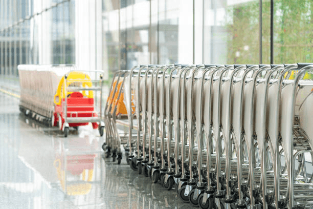 Baggage carts in a row at the airport