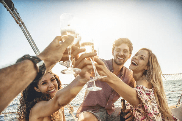 Friends making a toast on a cruise