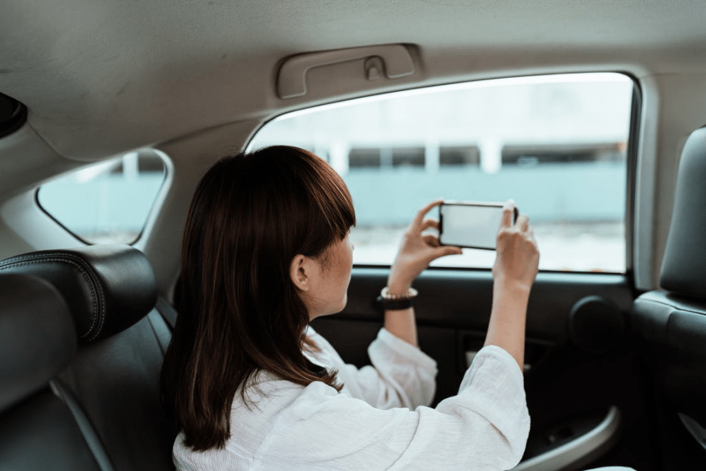 A passenger seated on the backseat of a Go Comfort taxi can make the most of sightseeing.