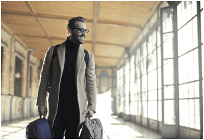 A man carrying two bags