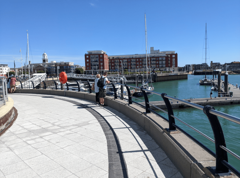 People are waiting at a cruise port