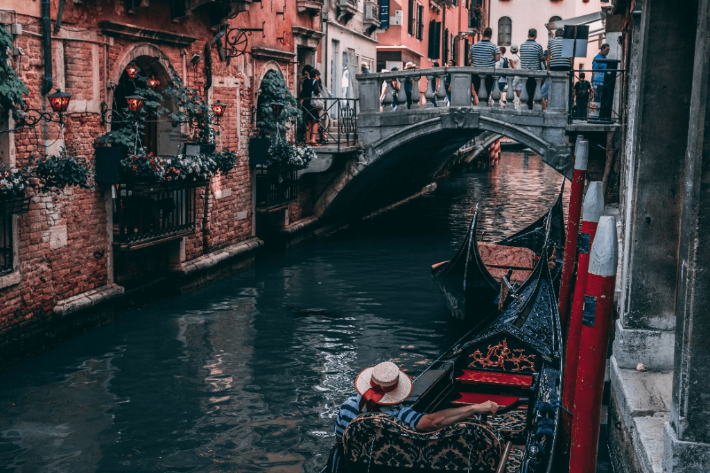 a man riding a gondola