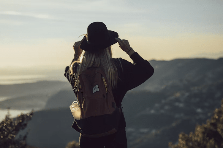 woman enjoying the scenic mountain view.