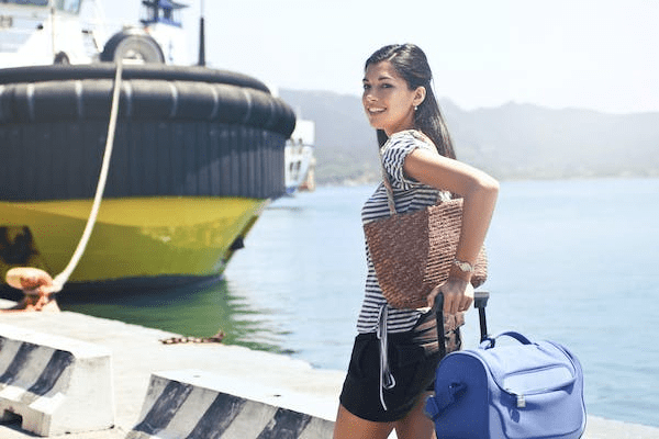 a woman boarding a cruise