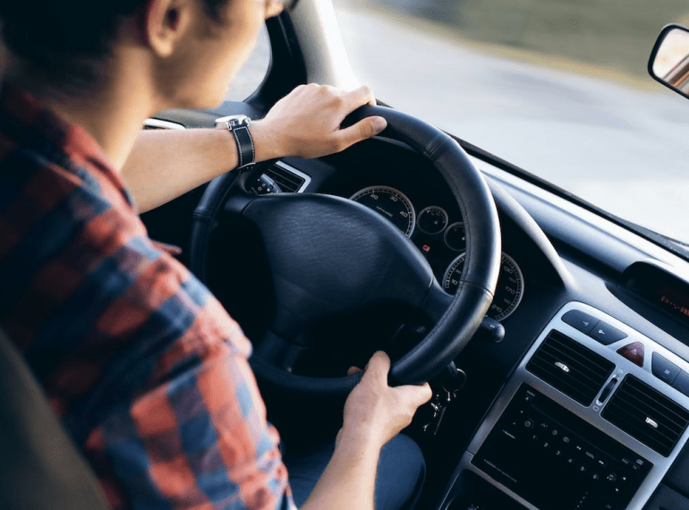 Man driving a vehicle