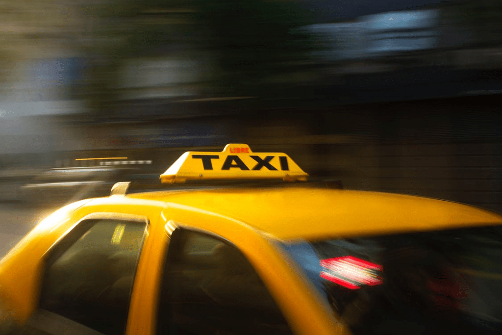 Panning photography of a yellow taxi