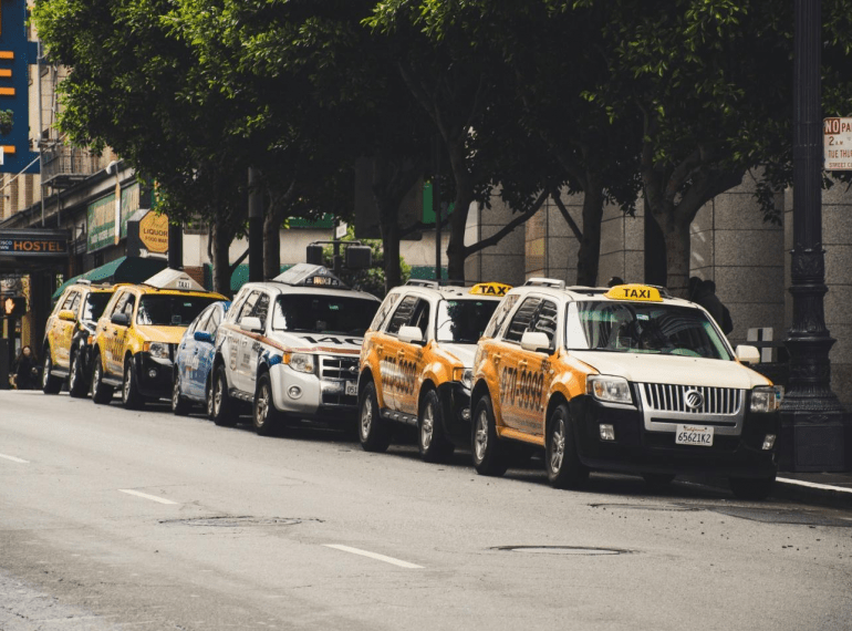 Taxis on the curb