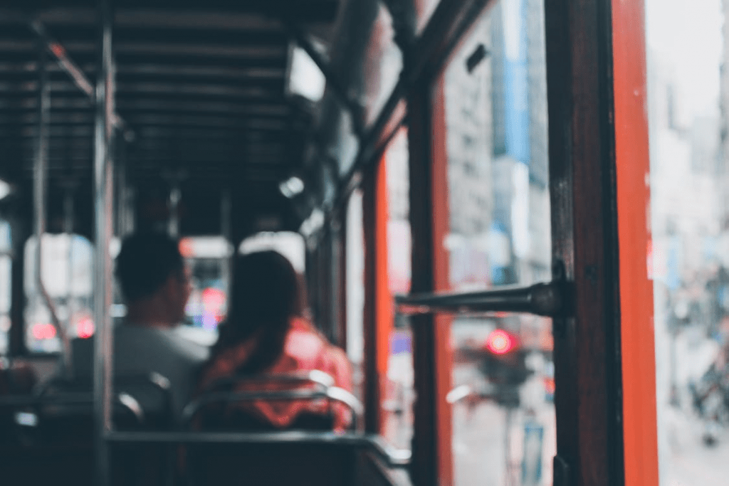 An image of a bus filled with commuters