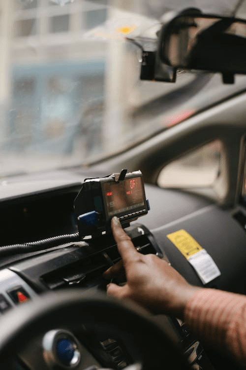 An image of a man using GPS in the car