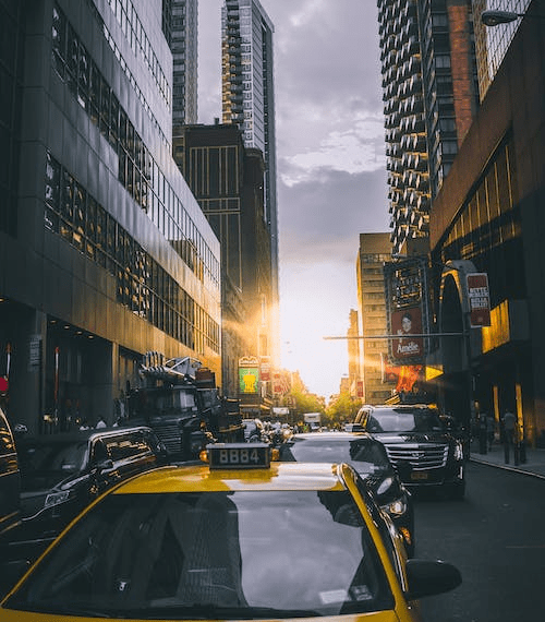 An image of cars on the road during rush hour