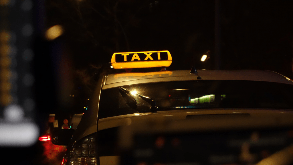 Yellow Light Taxi Sign