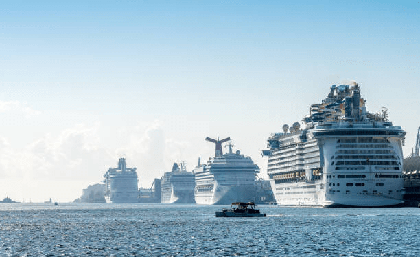 An image of several cruise ships on the sea