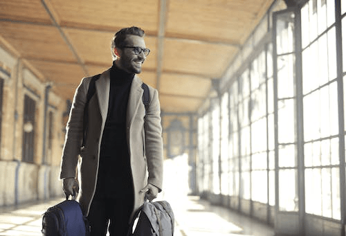 man carrying bags for trip